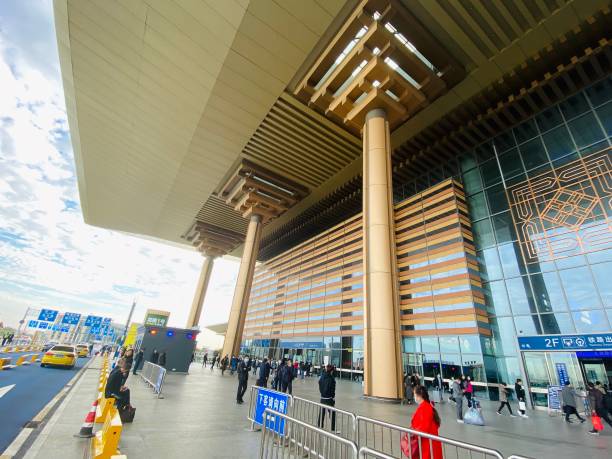 nanjing south railway station, china - editorial iphone train city imagens e fotografias de stock