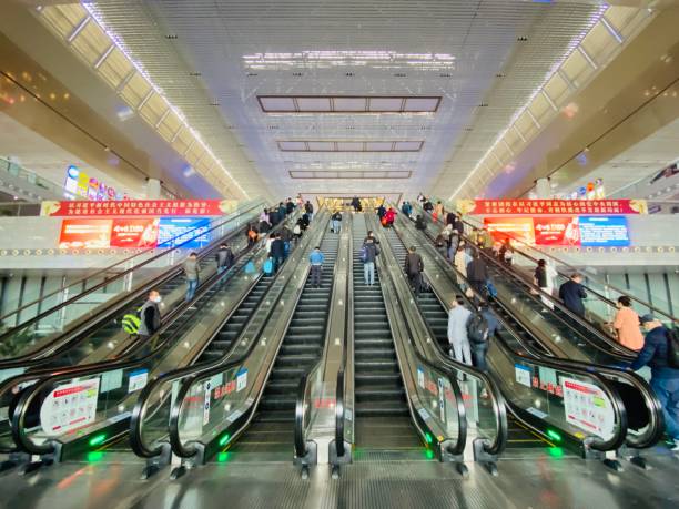 nanjing south railway station, china - editorial iphone train city stock-fotos und bilder