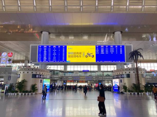 nanjing south railway station, china - editorial iphone train city stock-fotos und bilder