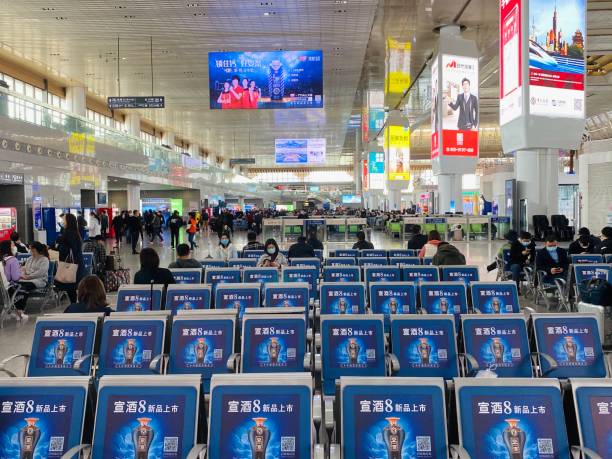 nanjing south railway station, china - editorial iphone train city imagens e fotografias de stock