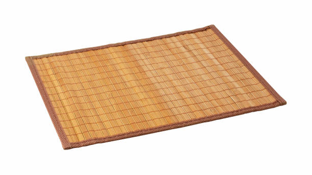 istock A bamboo luncheon mat on a white background. View from an angle 1283973566
