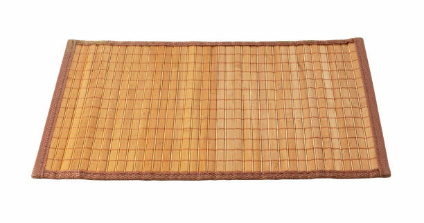 istock A bamboo luncheon mat on a white background. View from an angle 1283973582
