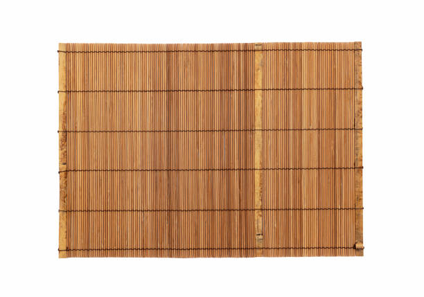 istock A wooden luncheon mat on a white background. A view from above 1283973765