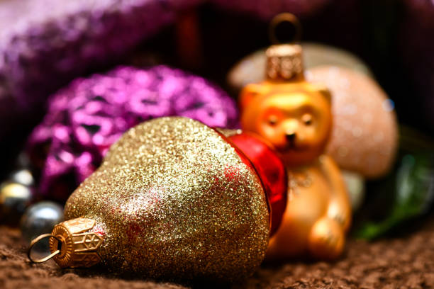 Christmas decoration on Christmas tree. Christmas tree at home. Christmas in apartment. Details of holiday.