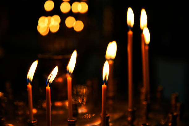istock Burning candles in Orthodox Christian church 1283976772