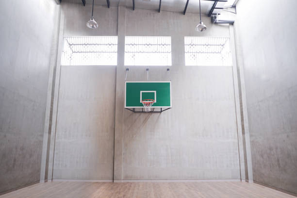 istock Basketball ring indoor hall with net ready for playing sport 1283980571