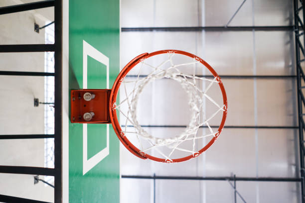 istock Basketball ring indoor hall with net ready for playing sport 1283980627