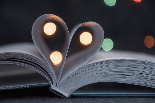 istock heart shape made from book's pages 1283985890