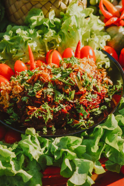 istock Spicy minced pork salad served with fresh vegetable 1283990554
