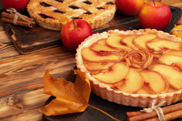Apple tart pie for Thanksgiving celebration on wooden table close up