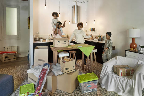 istock Young Family with Two Children Having Fun on Moving Day 1283992336
