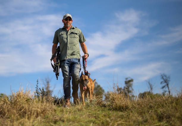 istock A game ranger with his dog doing anti poaching work 1283998161
