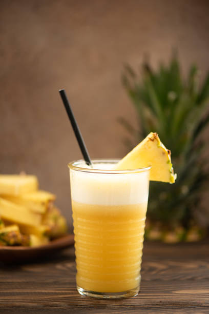 istock pineapple smoothie with fresh juice in glass glasses 1284000032