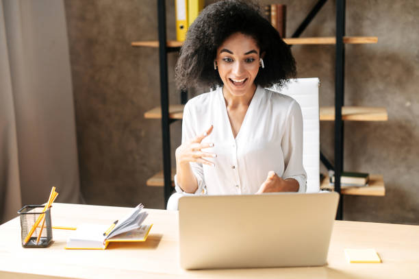 istock A young woman is using laptop at office 1284000149