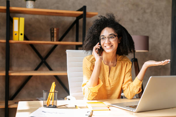 istock A young woman is using laptop at office 1284000158