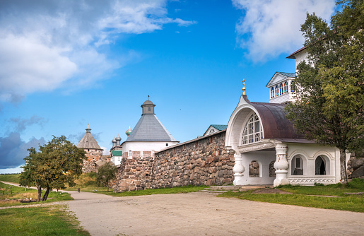 Holy gates of the Solovetsky Monastery and stone towers under the blue sky on the Solovetsky Islands