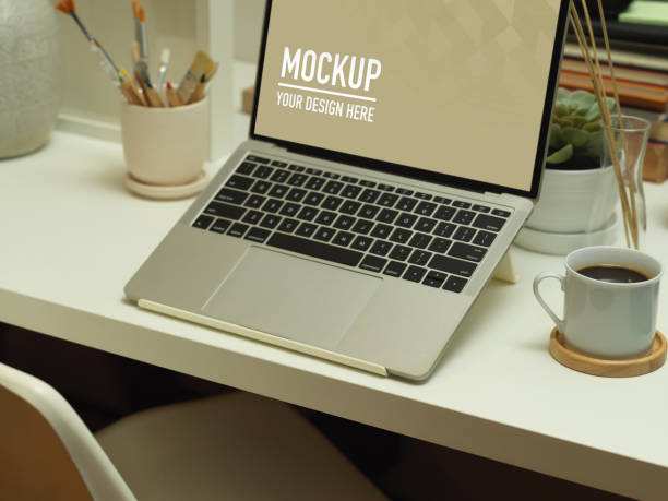 istock Workspace with laptop, supplies and coffee cup in home office room 1284007064