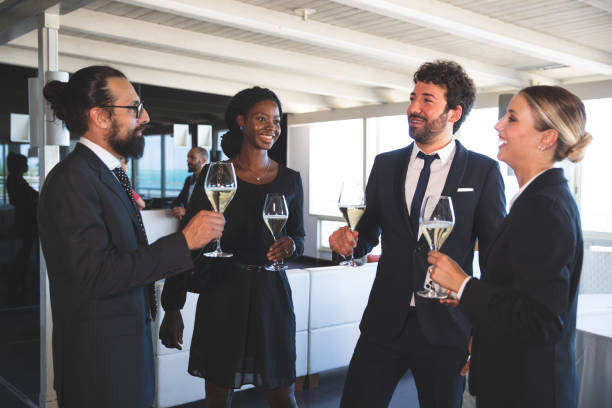 istock Business team celebrate success drinking in the office 1284008449