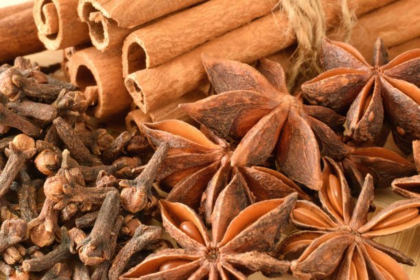 istock Spice anise stars, cinnamon sticks, cloves closed up 1284010147