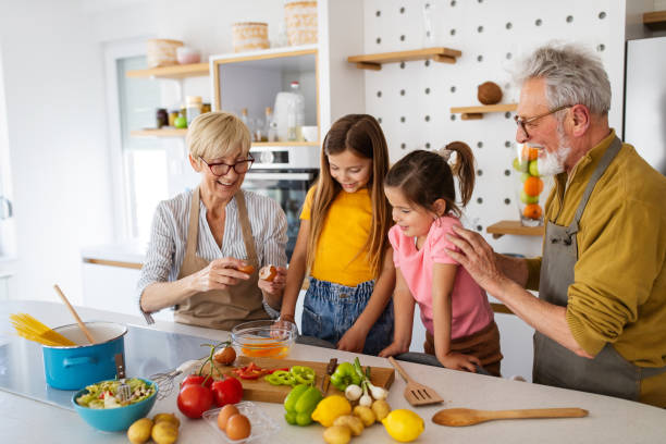 istock Grandchildren having fun at home while playing with their grandparents 1284010182