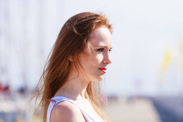 istock Sad woman walking outdoor 1284013573