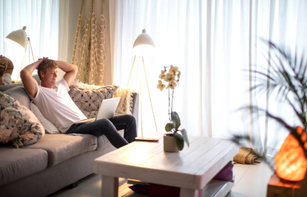 istock An an adult male working from home. 1284020974
