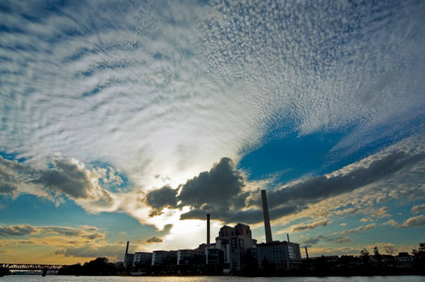Sky Evening sky in front of a combined heat and power plant in Frankfurt am Main climate crisis photos stock pictures, royalty-free photos & images
