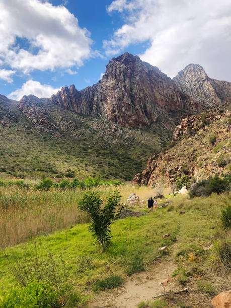 istock Children hiking in between beautiful mountain formations 1284023667