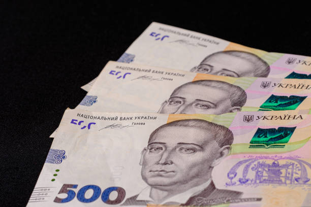 istock 500 Ukrainian hryvnia on a black background. 1284025736