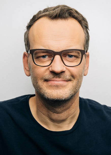 istock Confident mature man wearing eyeglasses 1284027536