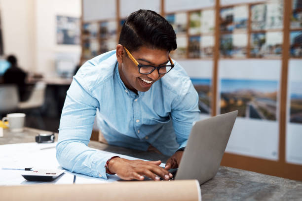 istock Connecting his designs with the world 1284030147
