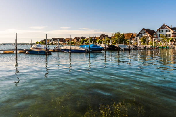 Houses and boats at the harbor in Ermatingen, Canton Thurgau, Switzerland