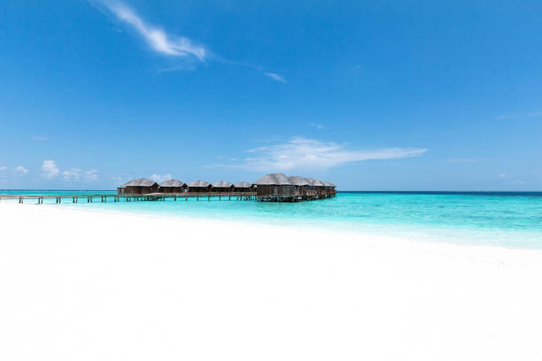 istock water bungalows at maldivian island 1284032670