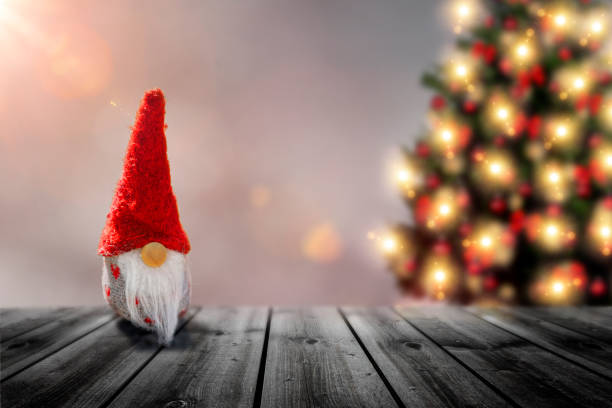 istock Little Santa Claus with Advent wreath 1284037345