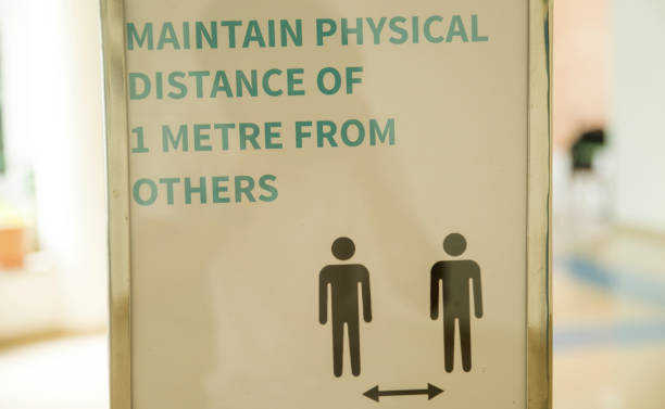 istock sign board about social distancing in a hotel 1284037540