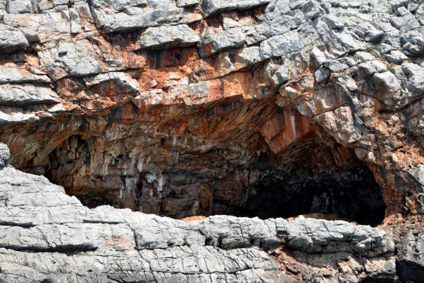 Caves in the rock by the sea