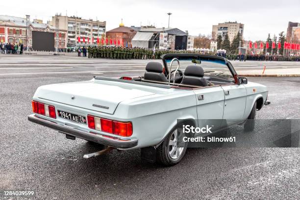 Parade Vehicle Gaz 3102 Volga Cabriolet At The City Square Stock Photo - Download Image Now