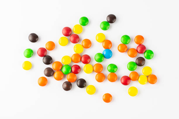 istock Group of colorful candies over white background 1284039766