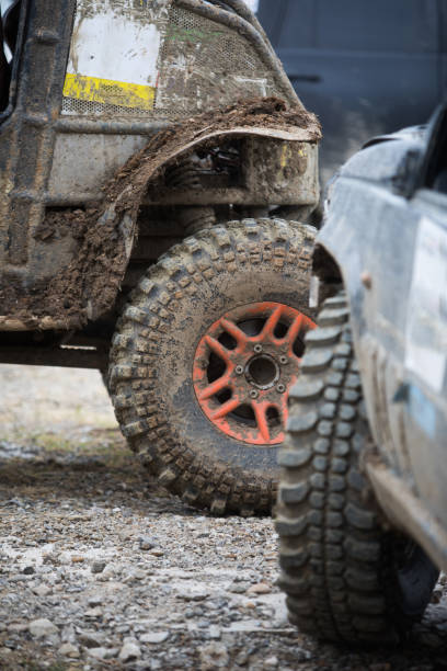 istock Muddy off road tire on a 4x4 car 1284040480