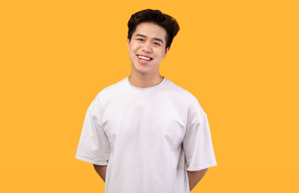 istock Portrait of attractive asian boy posing at studio 1284041358