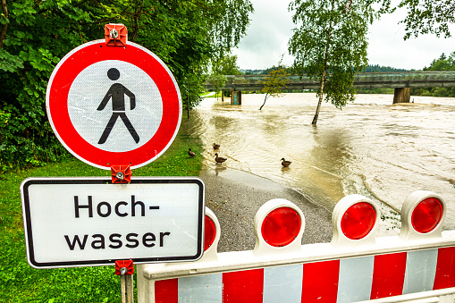 security barrier at a river because of highwater - translation: highwater