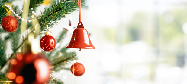 Merry Christmas and happy new year concept, Closeup Christmas bell  with bokeh, Xmas holiday background.