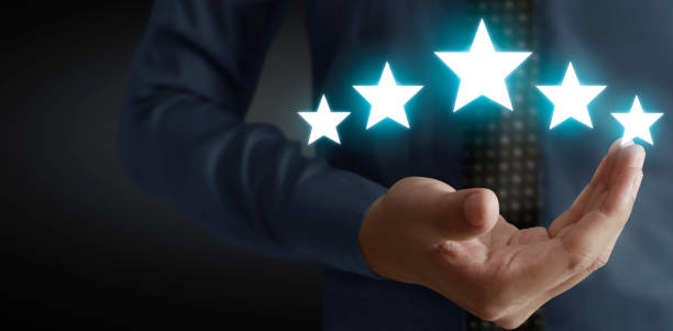 istock Rise on increasing five stars in human hand, Increase rating evaluation and classification concept 1284047052