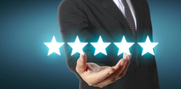 istock Rise on increasing five stars in human hand, Increase rating evaluation and classification concept 1284047061