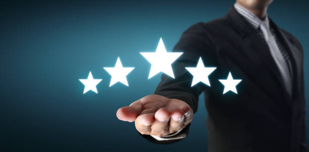 istock Rise on increasing five stars in human hand, Increase rating evaluation and classification concept 1284047063