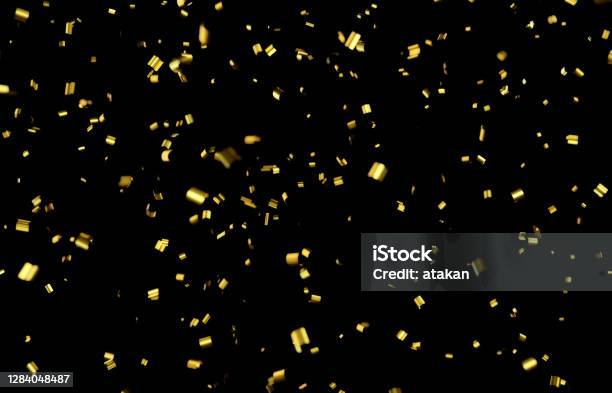 Gold Confetti On Black Background Stock Photo - Download Image Now - Confetti, Gold - Metal, Gold Colored