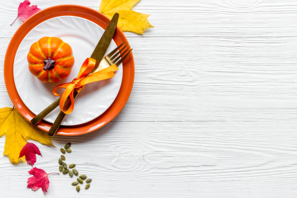 istock Autumn table setting for Thanksgiving day with dish and cutlery, overhead view 1284051687
