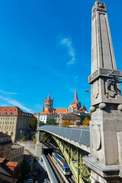 istock Cityscape with Bridge and Train and Cathedral over Lausanne 1284053339