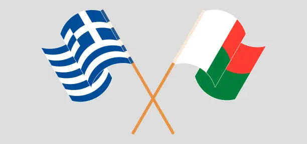 Vector illustration of Crossed and waving flags of Madagascar and Greece