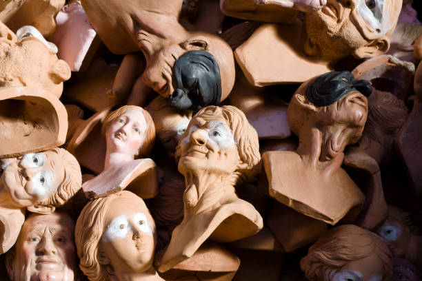 Naples, Italy - October 9, 2011: Heads of clay figurine for Neapolitan shepherds fro nativity scene rapresentation called Presepe, the Neapolitan tradition of Presepe is that in every home there is the Nativity scene reproduced by clay figurines.